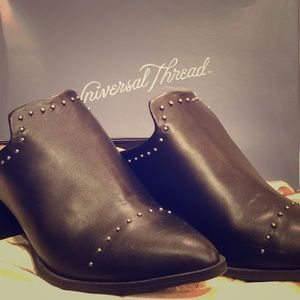 Black studded pointed toe mules